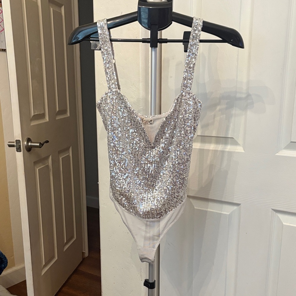 Free People Silver Sequin Bodysuit new with tags never worn